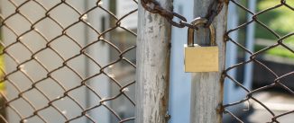 Close up on a lock gate and chain