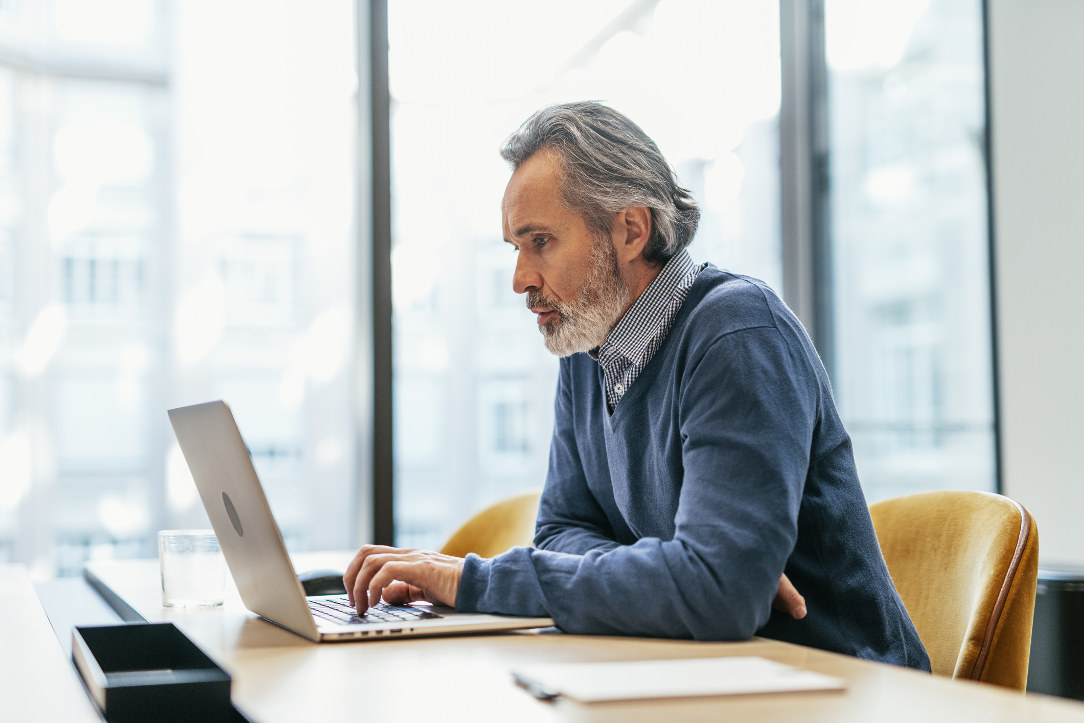 Business people dressed in smart casual clothing working in office